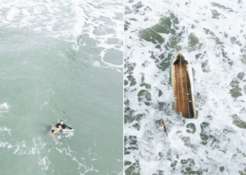 Surfista usa prancha em resgate de pescadores após barco virar no litoral de SP; VÍDEO